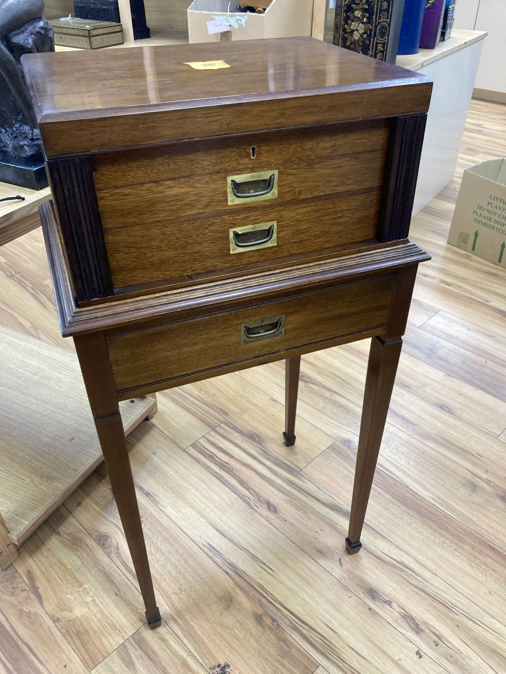 An early 20th century canteen, on stand, with single-lined drawers, lacks contents, width 52cm